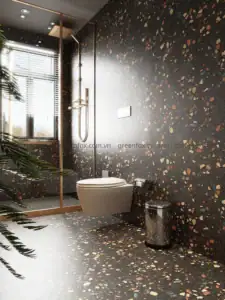 Gạch terrazzo nền đen nổi bật với hạt đá đa sắc, phù hợp phòng tắm cá tính.