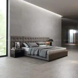 Tông xám xi măng cùng bề mặt hiệu ứng dệt vải tạo nên vẻ đẹp mạnh mẽ nhưng vẫn ấm cúng cho phòng ngủ hiện đại.