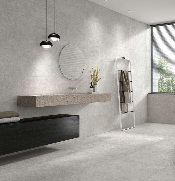 Gạch ốp tường nhà vệ sinh Gạch ốp hiệu ứng xi măng xám ghi, “bền gu” và dễ vệ sinh.