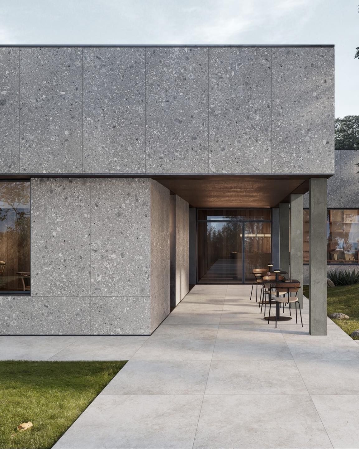 Gạch vân đá/bê tông xám ốp mặt tiền – mạnh mẽ, sang kiểu kiến trúc hiện đại.