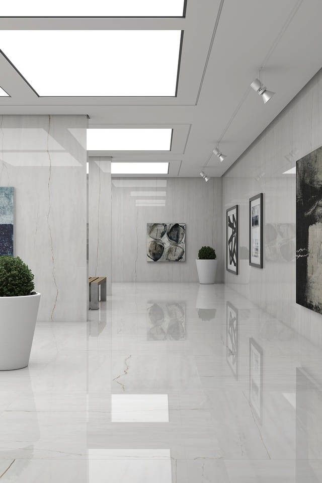 Gạch marble trắng vân mây nhẹ – hành lang nhìn rộng, sạch và cao cấp.