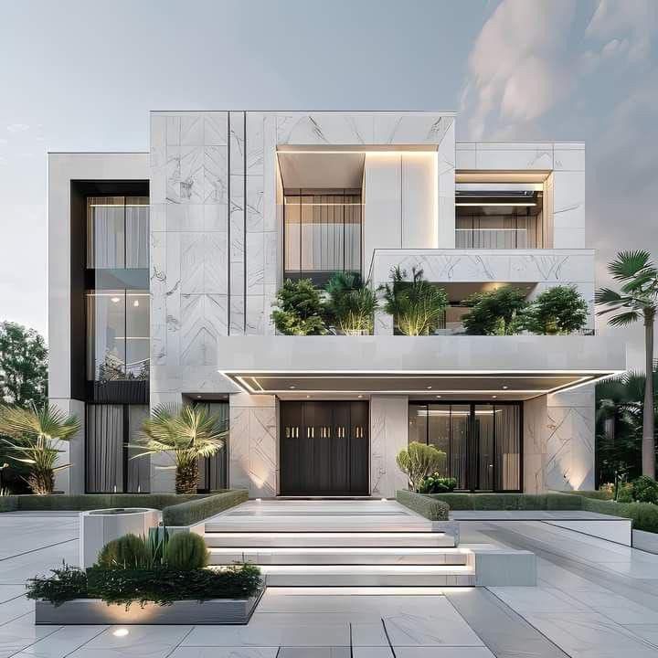 Gạch marble trắng vân mây ốp toàn bộ khối mặt tiền, đường ron tối giản mang lại tổng thể hiện đại, tinh tế và đẳng cấp như biệt thự cao cấp.