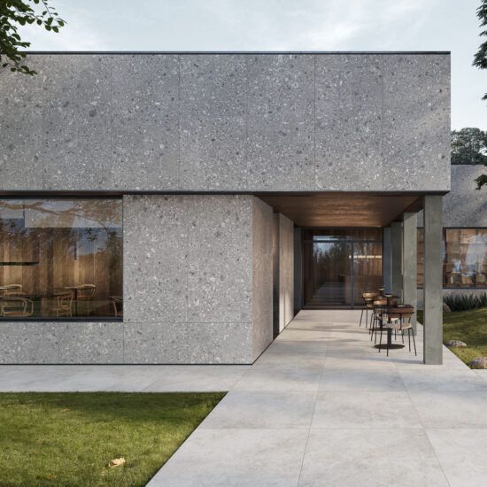 Gạch terrazzo xám hạt đá nổi bật với bề mặt hạt khoáng tự nhiên, tạo chiều sâu và cảm giác bền chắc cho mặt tiền hiện đại.