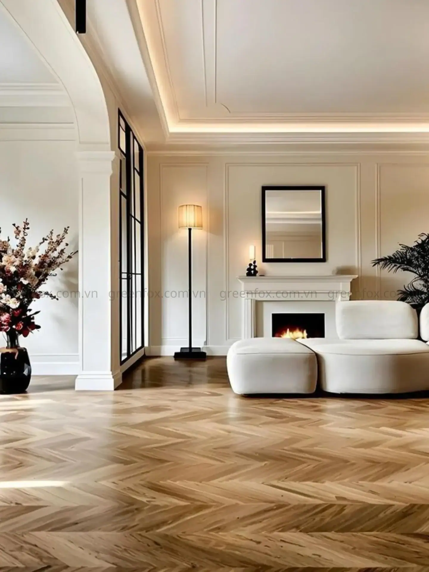 Kiểu lát herringbone với gạch giả gỗ tông sáng giúp không gian phòng khách thêm thanh lịch, tạo chiều sâu thị giác và cảm giác rộng rãi hơn.