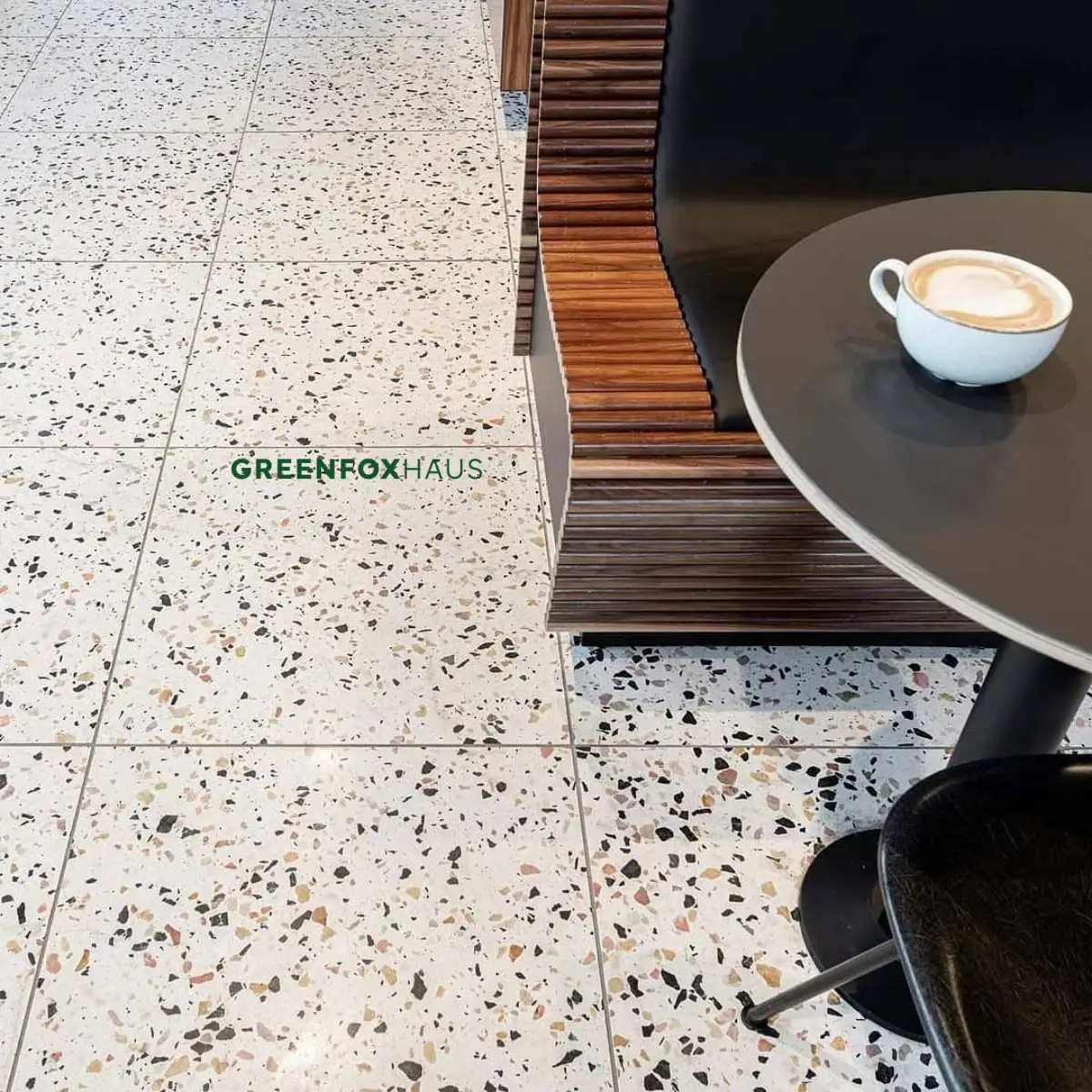 Gạch lát terrazzo nền quán cà phê kết hợp nội thất bàn ghế gỗ tông trầm tinh tế