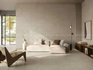 Phòng khách sử dụng gạch ốp tường vân xi măng màu be khổ lớn