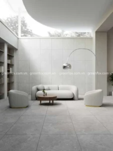 Gạch ốp tường phòng khách màu xám nhạt vân xi măng kết hợp gạch lát nền đồng bộ
